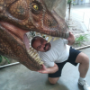 Ivan sendo devorado por um dinossauro